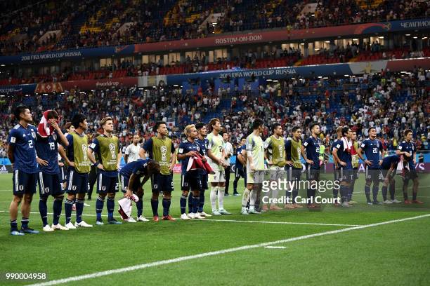 The Japan team show their appreciation to their fans following their defeat in the 2018 FIFA World Cup Russia Round of 16 match between Belgium and...