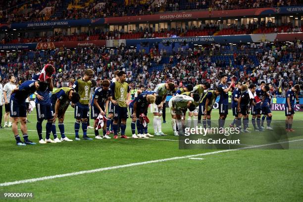 The Japan team show their appreciation to their fans following their defeat in the 2018 FIFA World Cup Russia Round of 16 match between Belgium and...