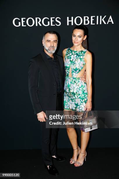 Designer Georges Hobeika poses with Paola Turani after the final of the George Hobeika Haute Couture Fall Winter 2018/2019 show as part of Paris...