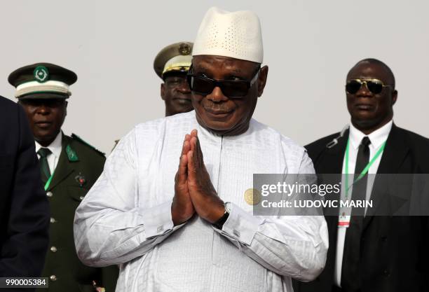 Malian president Ibrahim Boubacar Keita gestures during the African Union summit in Nouakchott on July 2, 2018. - Macron, making an exceptional...