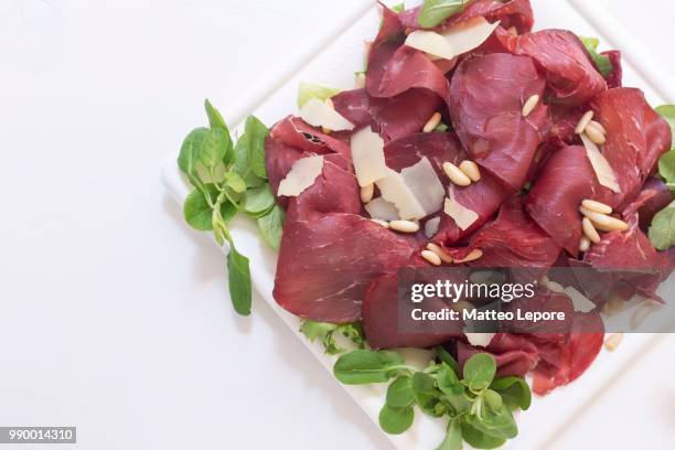 bresaola salad - bresaola stock pictures, royalty-free photos & images