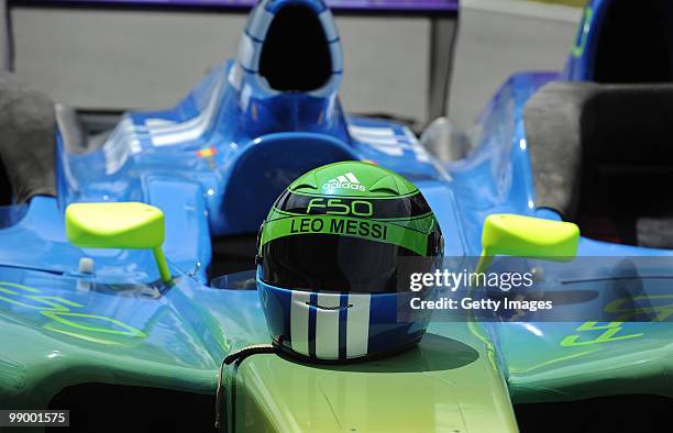 Racing helmet shows the name of Argentine football player Leo Messi at the Circuiit de Catalunya, scene of the adidas F50 adiZero football boot...