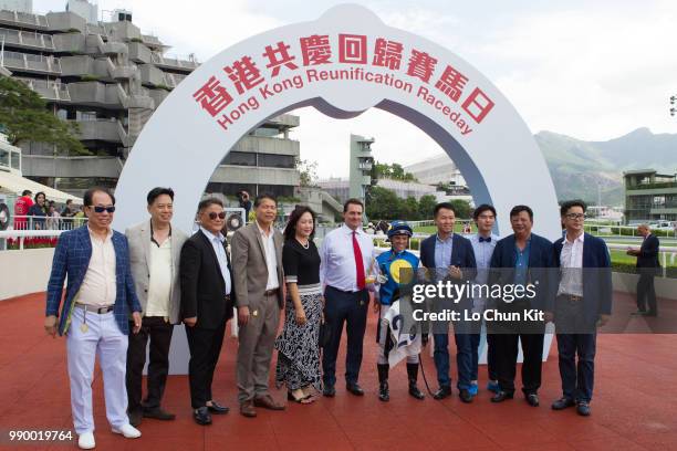 Jockey Umberto Rispoli, trainer Michael Freedman and owners celebrate after Fiama winning Race 3 Uncompromising Integrity 2000m Handicap at Sha Tin...