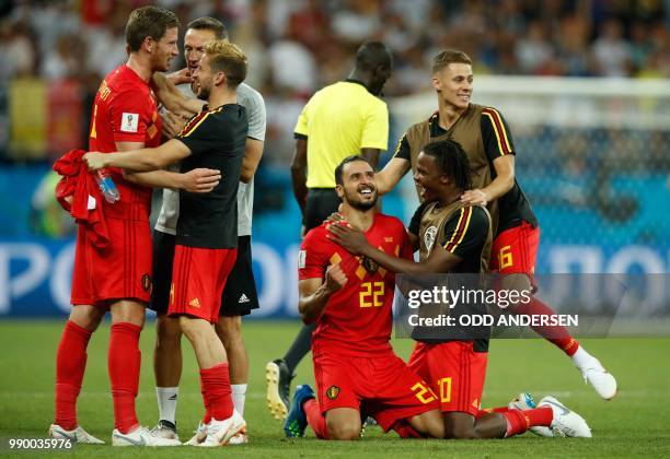 Belgium's defender Jan Vertonghen, Belgium's forward Dries Mertens, Belgium's midfielder Nacer Chadli, Belgium's defender Dedryck Boyata and...