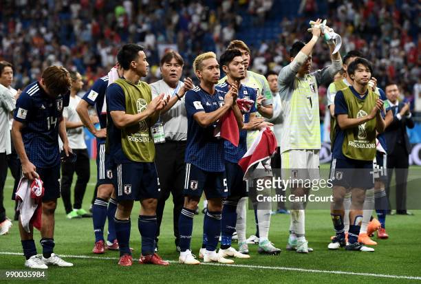 Japan players shows appreciation to the fans following their sides defeat in the 2018 FIFA World Cup Russia Round of 16 match between Belgium and...