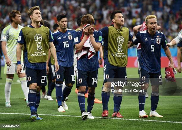 Japan players shows appreciation to the fans following their sides defeat in the 2018 FIFA World Cup Russia Round of 16 match between Belgium and...