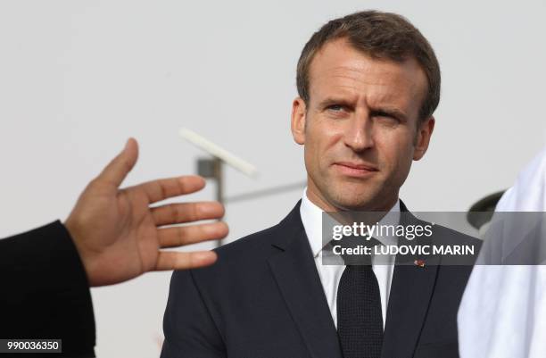 French President Emmanuel Macron looks on during the African Union summit in Nouakchott on July 2, 2018. - Macron, making an exceptional appearance...