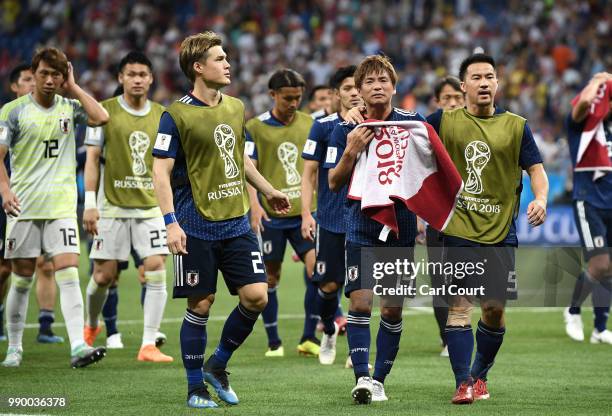 Japan players shows appreciation to the fans following their sides defeat in the 2018 FIFA World Cup Russia Round of 16 match between Belgium and...