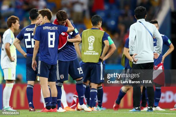 Genki Haraguchi and Hiroki Sakai of Japan show their dejection following the 2018 FIFA World Cup Russia Round of 16 match between Belgium and Japan...