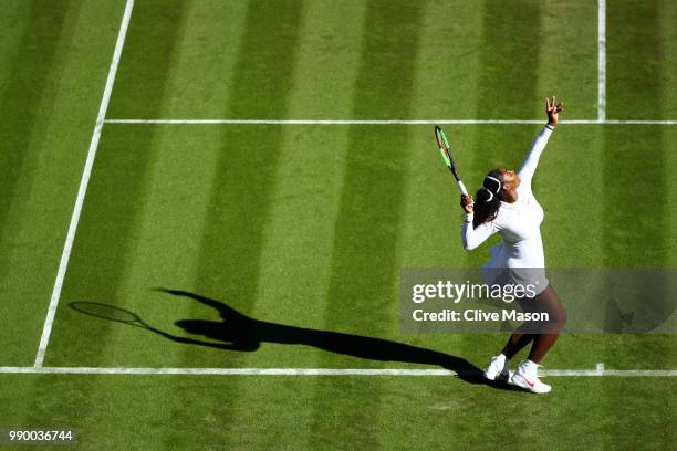 Serena Williams of The United States serves against Arantxa Rus of The Netherlands during their Ladies' Singles first round match on day one of the...