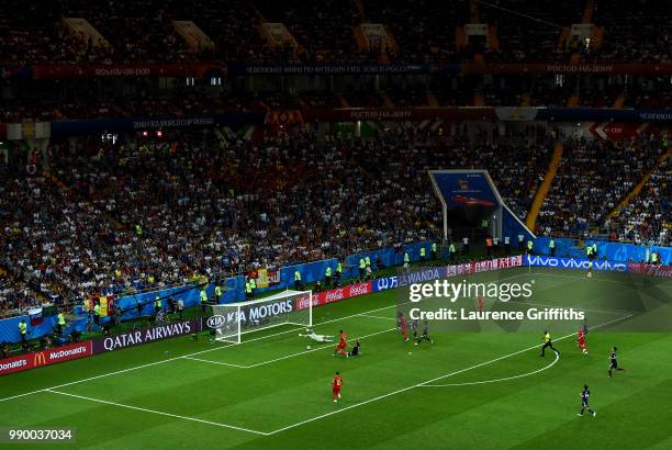 Nacer Chadli of Belgium scores past Eiji Kawashima of Japan his team's third goal during the 2018 FIFA World Cup Russia Round of 16 match between...