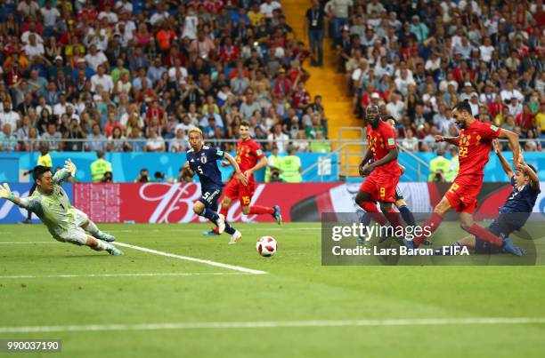 Nacer Chadli of Belgium scores past Eiji Kawashima of Japan his team's third goal during the 2018 FIFA World Cup Russia Round of 16 match between...