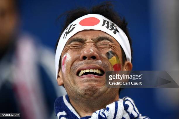 Japan fan looks dejected following their sides defeat in the 2018 FIFA World Cup Russia Round of 16 match between Belgium and Japan at Rostov Arena...