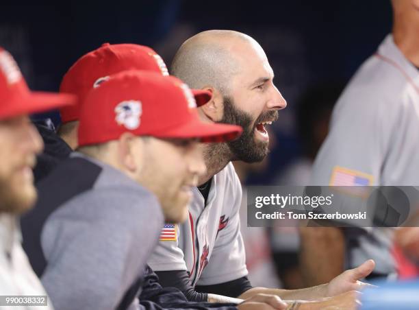 Mike Fiers of the Detroit Tigers yells out from the dugout after he was taken out of the game in the ninth inning during MLB game action against the...