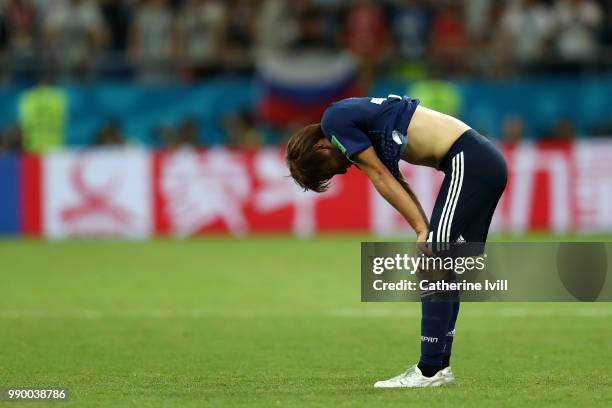 Takashi Inui of Japan looks dejected following his sides defeat in the 2018 FIFA World Cup Russia Round of 16 match between Belgium and Japan at...