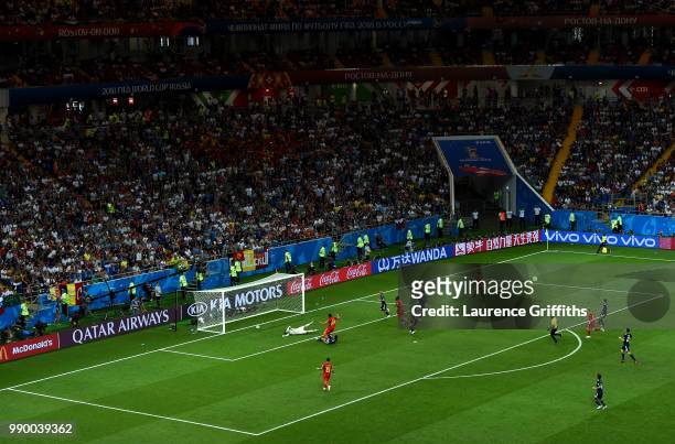 Nacer Chadli of Belgium scores past Eiji Kawashima of Japan his team's third goal during the 2018 FIFA World Cup Russia Round of 16 match between...