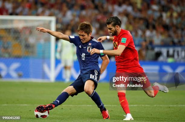 Yannick Carrasco of Belgium in action against Genki Haraguchi of Japan during the 2018 FIFA World Cup Russia Round of 16 match between Belgium and...