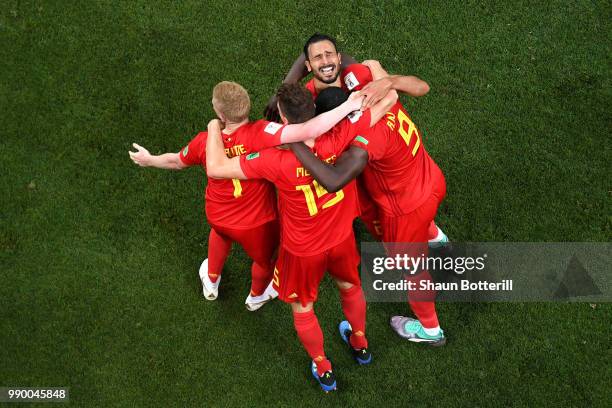 Nacer Chadli of Belgium celebrates after scoring his team's third goal with team mates during the 2018 FIFA World Cup Russia Round of 16 match...