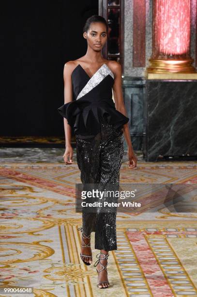 Tami Williams walks the runway during the Redemption Haute Couture Fall Winter 2018/2019 show as part of Paris Fashion Week on July 2, 2018 in Paris,...