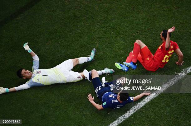 Belgium's midfielder Nacer Chadli scores his team's winning goal past Japan's goalkeeper Eiji Kawashima during the Russia 2018 World Cup round of 16...