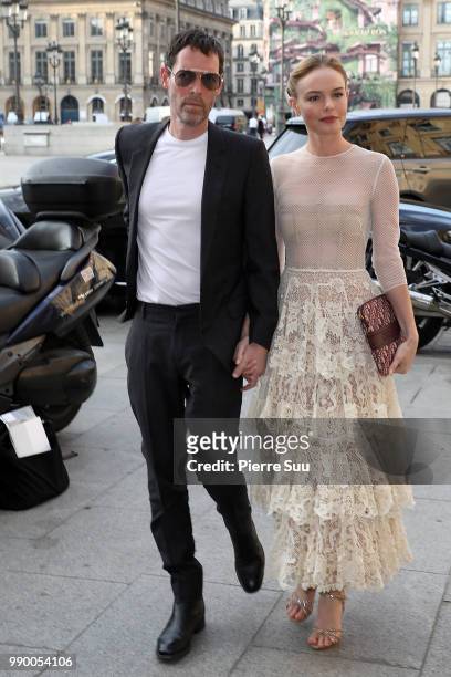 Kate Bosworth and her husband Michael Polish arrives at a Dior dinner at the Place Vendome on July 2, 2018 in Paris, France.