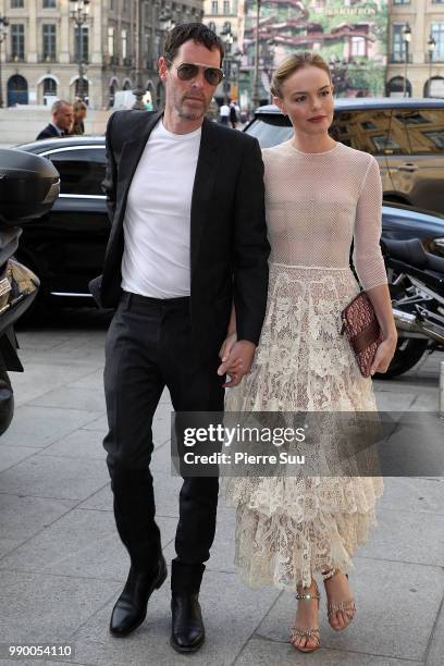 Kate Bosworth and her husband Michael Polish arrives at a Dior dinner at the Place Vendome on July 2, 2018 in Paris, France.
