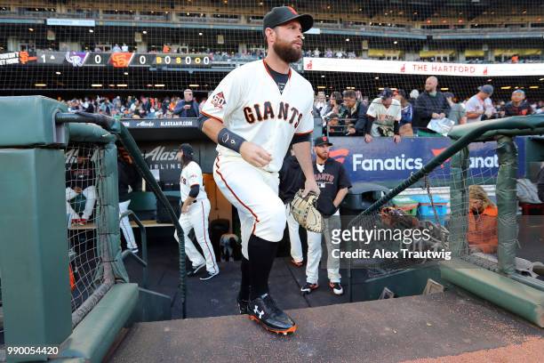 Brandon Belt of the San Francisco Giants takes the field for a game against the Colorado Rockies at AT&T Park on Tuesday, June 26, 2018 in San...