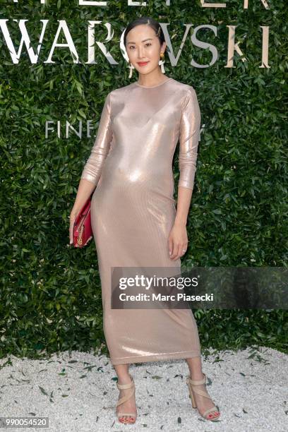Chriselle Lim attends the Atelier Swarovski : Cocktail Of The New Penelope Cruz Fine Jewelry Collection as part of Paris Fashion Week on July 2, 2018...