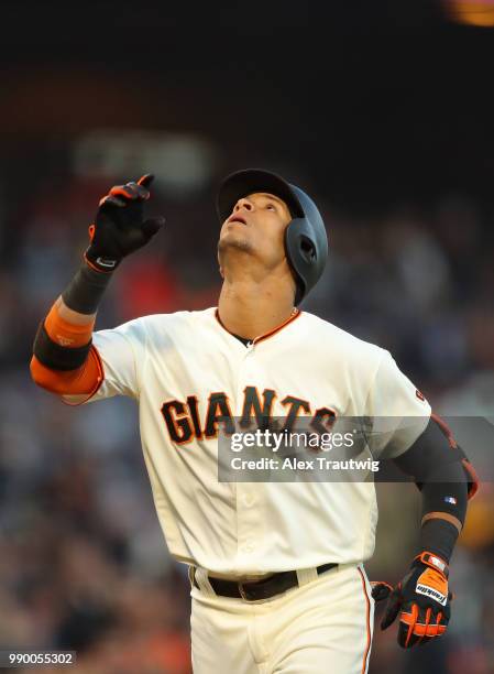 Gorkys Hernandez of the San Francisco Giants celebrates hitting a solo home run in the third inning during a game against the Colorado Rockies at...