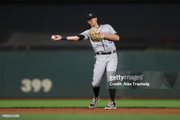 LeMahieu of the Colorado Rockies throws to first base during a game against the San Francisco Giants at AT&T Park on Tuesday, June 26, 2018 in San...