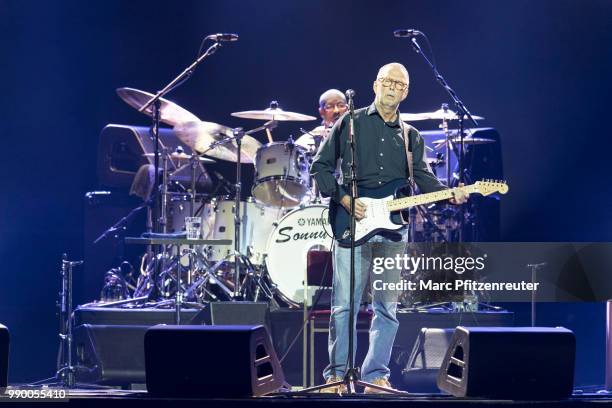 Eric Clapton performs onstage at the Lanxess Arena on July 2, 2018 in Cologne, Germany.