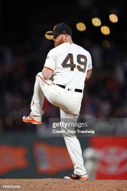 Sam Dyson of the San Francisco Giants pitches during a game against the Colorado Rockies at AT&T Park on Tuesday, June 26, 2018 in San Francisco,...