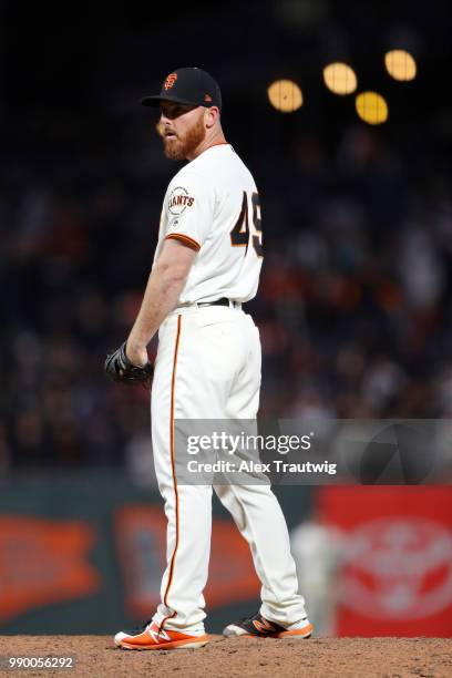 Sam Dyson of the San Francisco Giants pitches during a game against the Colorado Rockies at AT&T Park on Tuesday, June 26, 2018 in San Francisco,...