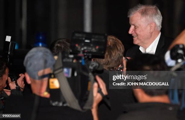 German Interior Minister and leader of the Bavarian Christian Social Union Horst Seehofer addresses media after a meeting with the German Chancellor...