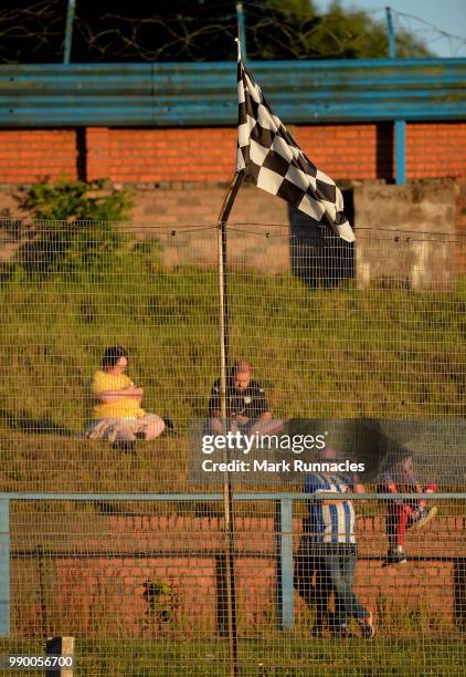Fans look on at Central Park which also doubles as a stock car racing circuit during the pre-season friendly between Cowdenbeath and Dundee at...