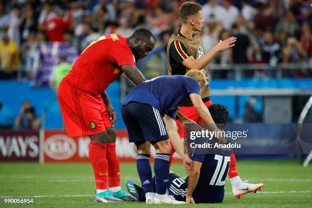 Players of Japan react after loosing the 2018 FIFA World Cup Russia Round of 16 match between Belgium and Japan at the Rostov Arena Stadium in Rostov...