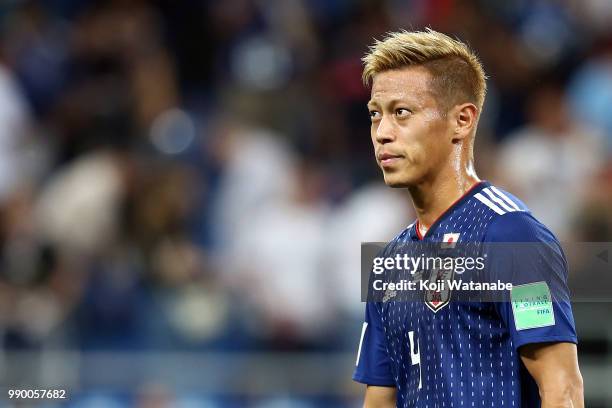 Keisuke Honda of Japan looks dejected at the end of the 2018 FIFA World Cup Russia Round of 16 match between Belgium and Japan at Rostov Arena on...