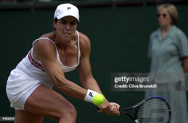 Jennifer Capriati of the USA on her way to victory over Serena Williams of the USA during the women's quarter finals of The All England Lawn Tennis...