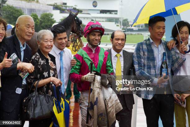 Jockey Joao Moreira, trainer Derek Cruz and owners celebrate after Elusive State winning Race 5 Continuous Development 1650m Handicap at Sha Tin...