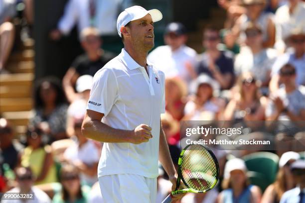 Sam Querrey of the United States celebrates winning his Men's Singles first round match against Jordan Thompson of Australia on day one of the...