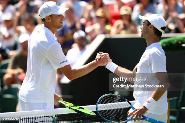 Sam Querrey of the United States celebrates winning his Men's Singles first round match against Jordan Thompson of Australia on day one of the...