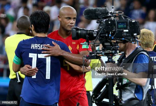 Vincent Kompany of Belgium greets Makoto Hasebe of Japan following the 2018 FIFA World Cup Russia Round of 16 match between Belgium and Japan at...