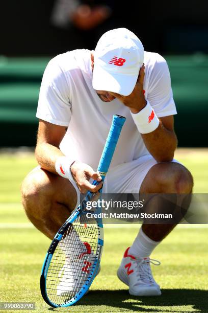 Jordan Thompson of Australia reacts in his Men's Singles first round match against Sam Querrey of the United States on day one of the Wimbledon Lawn...