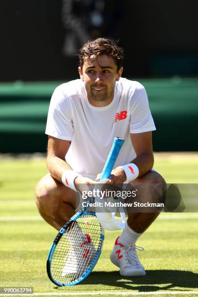 Jordan Thompson of Australia reacts in his Men's Singles first round match against Sam Querrey of the United States on day one of the Wimbledon Lawn...