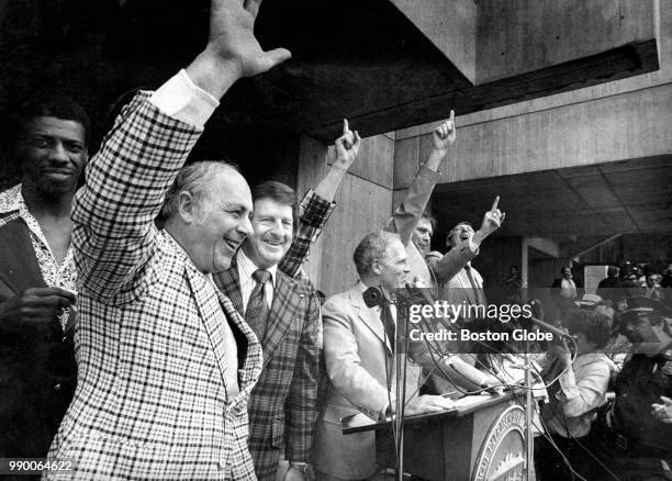 From left, Boston Celtics player Charlie Scott, team president and general manager Red Auerbach, team co-owner Harold Lipton, Boston Mayor Kevin...