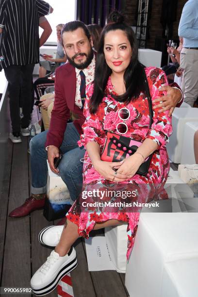 Manuel Cortez and Miyabi Kawai attend the Lascana show during the Berlin Fashion Week Spring/Summer 2019 at Hotel nhow on July 2, 2018 in Berlin,...