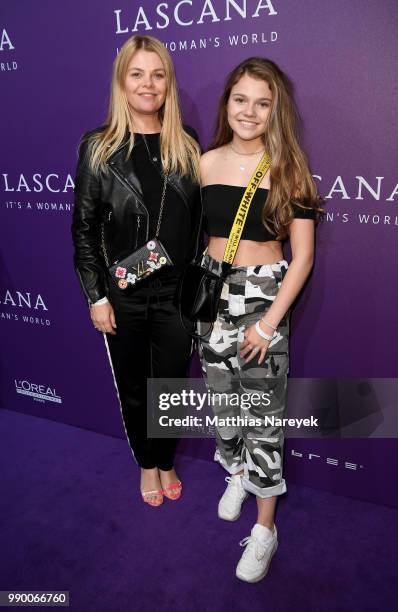 Youtubestar and actress Faye Montana and her mother German actress Anne-Sophie Briest attend the Lascana show during the Berlin Fashion Week...