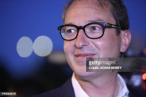 Alexander Dobrindt, first deputy leader of the CDU/CSU group in the Bundestag leaves the German Christian Democrats headquarters in Berlin on July 2,...