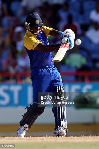 Angelo Mathews of Sri Laka hits out during the ICC Super Eight match between India and Sri Lanka played at the Beausejour Cricket Ground on May 11,...