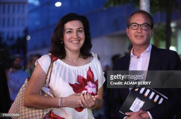 Alexander Dobrindt , first deputy leader of the CDU/CSU group in the Bundestag poses with Dorothee Baer, state minister for digitalization as they...